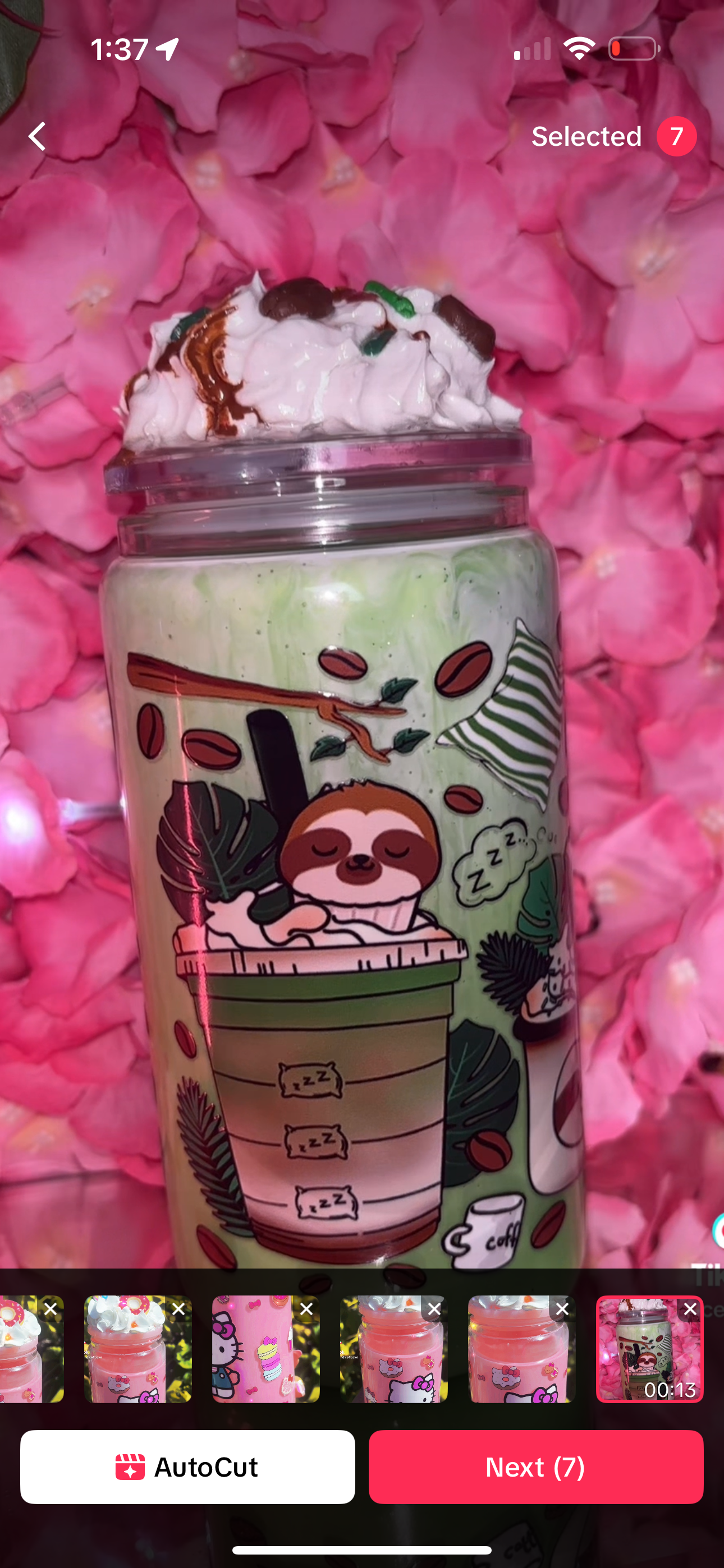 Matcha tea late snow globe with a whipped coffee bean & sprinkle topper with caramel
